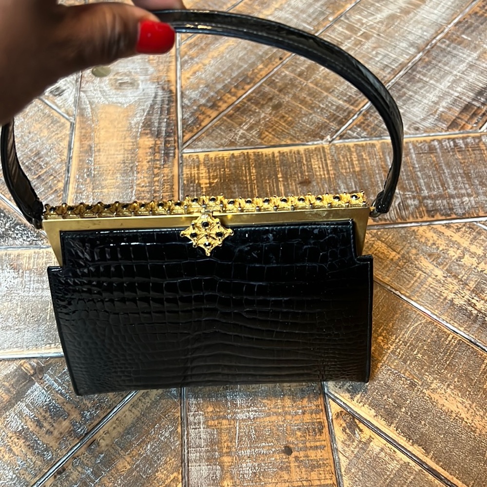 Vintage Susan Gail Original black leather handbag with beautiful gold details.